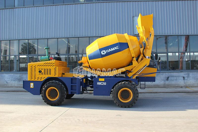 Self-loading concrete mixer